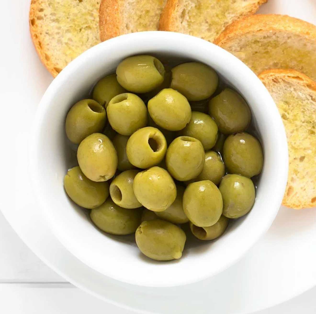 Pitted green olives